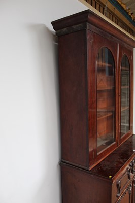 Lot 170 - Victorian mahogany two height secretaire bookcase, with fitted drawer and cupboards below, with retailers label for George Rickword of Colchester, 125cm wide x 53cm deep x 220cm high overall