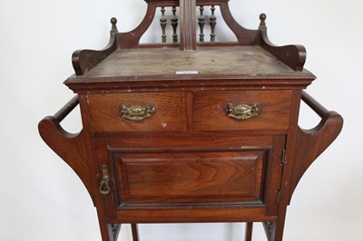 Lot 173 - Edwardian mahogany wash stand with raised mirror back, twin drawers above a cupboard and ledge below, 59cm wide x 33cm deep x 150cm high
