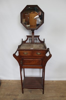 Lot 173 - Edwardian mahogany wash stand with raised mirror back, twin drawers above a cupboard and ledge below, 59cm wide x 33cm deep x 150cm high