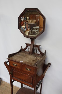 Lot 173 - Edwardian mahogany wash stand with raised mirror back, twin drawers above a cupboard and ledge below, 59cm wide x 33cm deep x 150cm high