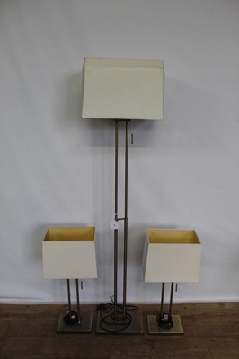 Lot 177 - Trio of contemporary brushed brass finished lamps comprising standard lamp and pair of table lamps, with rectangular shades