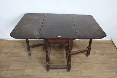 Lot 185 - 18th century oak drop-flap gateleg table with turned supports joined by stretchers, 94cm wide