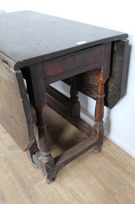 Lot 185 - 18th century oak drop-flap gateleg table with turned supports joined by stretchers, 94cm wide