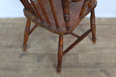 Lot 187 - Antique beech high back spindle elbow chair on turned legs