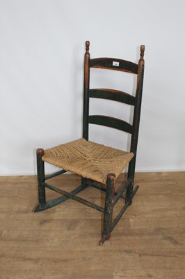 Lot 189 - 19th century painted ladder back rocking chair with rush seat