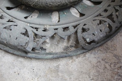 Lot 190 - Impressive large late 19th century Dutch brass planter with lions ring handles and embossed flowers on ornate base with pierced decoration 98cm high. The planter 55cm diameter.