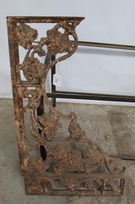 Lot 192 - Pair of antique cast iron brackets, wrought iron garden chair (lacking slats) and a brass coffee table frame (4)