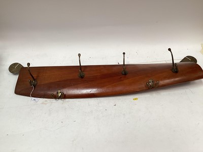 Lot 781 - Unusual coat rack constructed from a fragment of a First World War period aircraft propeller, 94.5cm in length (excluding brackets)