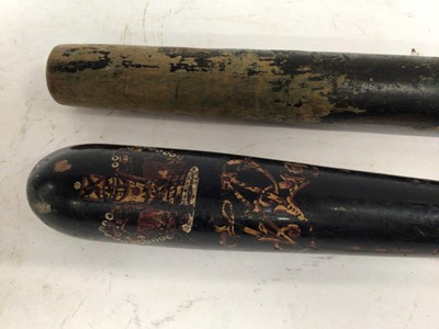 Lot 800 - Two 19th century painted Police truncheons, one decorated with a shield, 45cm the other with crowned VR cipher, 41 cm (2)