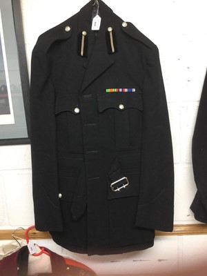 Lot 844 - Elizabeth II Police officers' jacket and trousers with buttons and mounted medal ribbons.