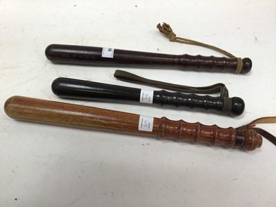 Lot 809 - Three turned wooden Police truncheons