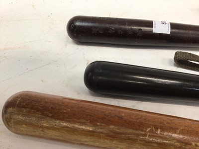 Lot 809 - Three turned wooden Police truncheons