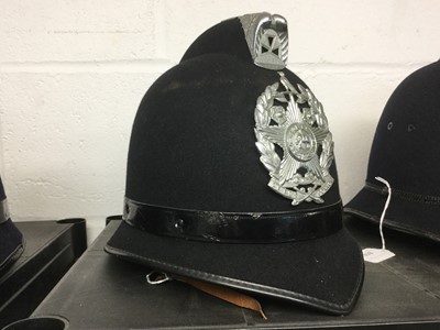 Lot 817 - Elizabeth II Leeds City Police helmet with badge
