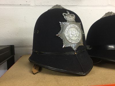 Lot 824 - Elizabeth II Metropolitan Police helmet with badge