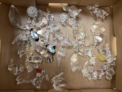 Lot 1303 - Selection of Swarovski crystal animals including monkey carrying bananas, Elephants, birds etc