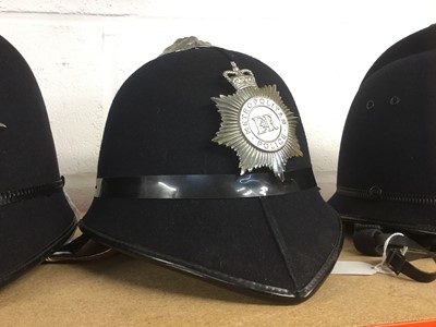 Lot 825 - Elizabeth II Metropolitan Police helmet with badge
