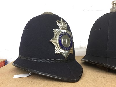 Lot 829 - Elizabeth II Metropolitan Police helmet with enamelled badge