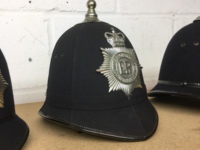 Lot 830 - Elizabeth II Nottinghamshire Constabulary helmet with badge