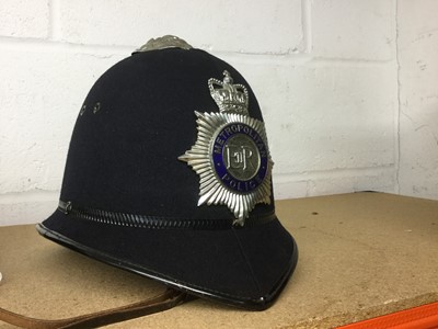 Lot 831 - Elizabeth II Metropolitan Police helmet with enamel badge