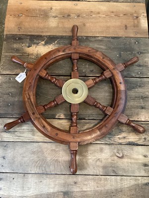 Lot 2528 - Modern mahogany ships wheel, 65cm in diameter