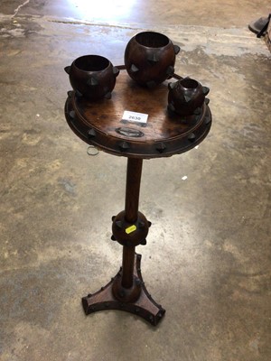 Lot 2630 - Unusual early 20th century gothic oak smokers stand, 78cm in height.