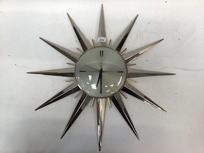 Lot 2559 - Metamec silver coloured sunburst clock