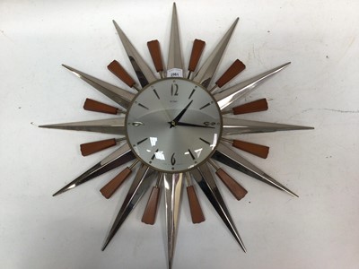 Lot 2561 - Metamec silver and wood sunburst clock, 60cm wide