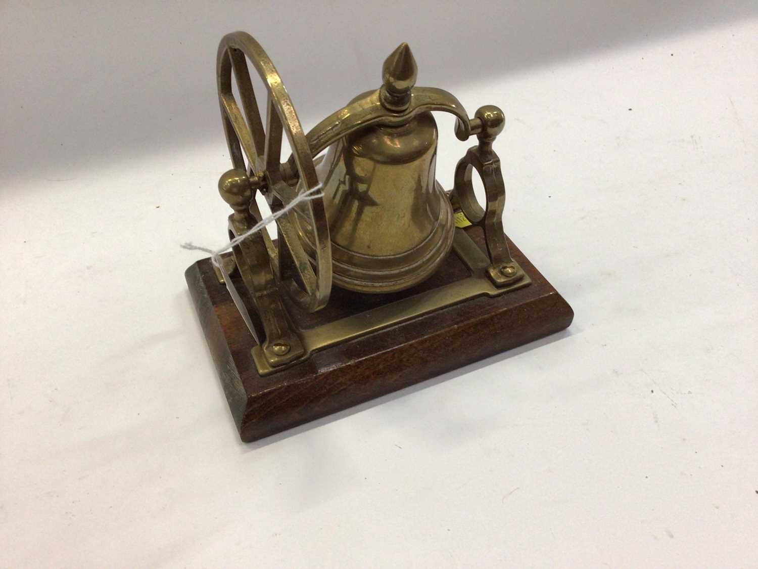 Lot 2590 - Brass table / dinner bell mounted on wooden