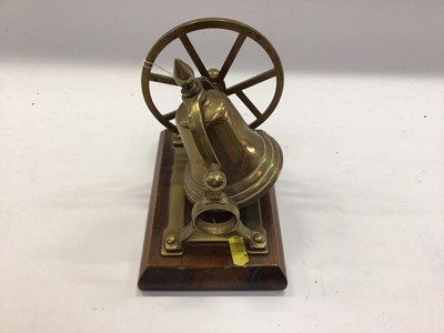 Lot 2590 - Brass table / dinner bell mounted on wooden base.