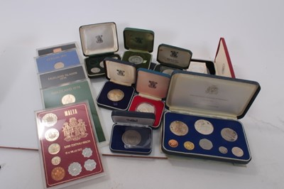 Lot 498 - World - Mixed coinage to include silver proof year sets.G.B. George V silver Crown 1935 E.F. Israel Egypt Peace Medal 1979 and other issues (qty)