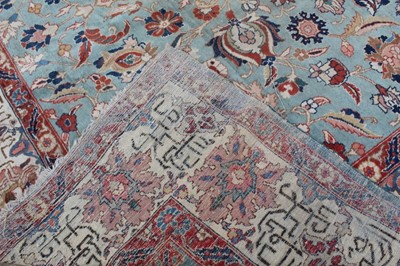 Lot 1536 - Large Turkish design rug on turquoise ground