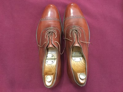 Lot 2133 - A pair of Gentlemen's dark tan handmade leather shoes by  Alan McAfee Dover St. London.