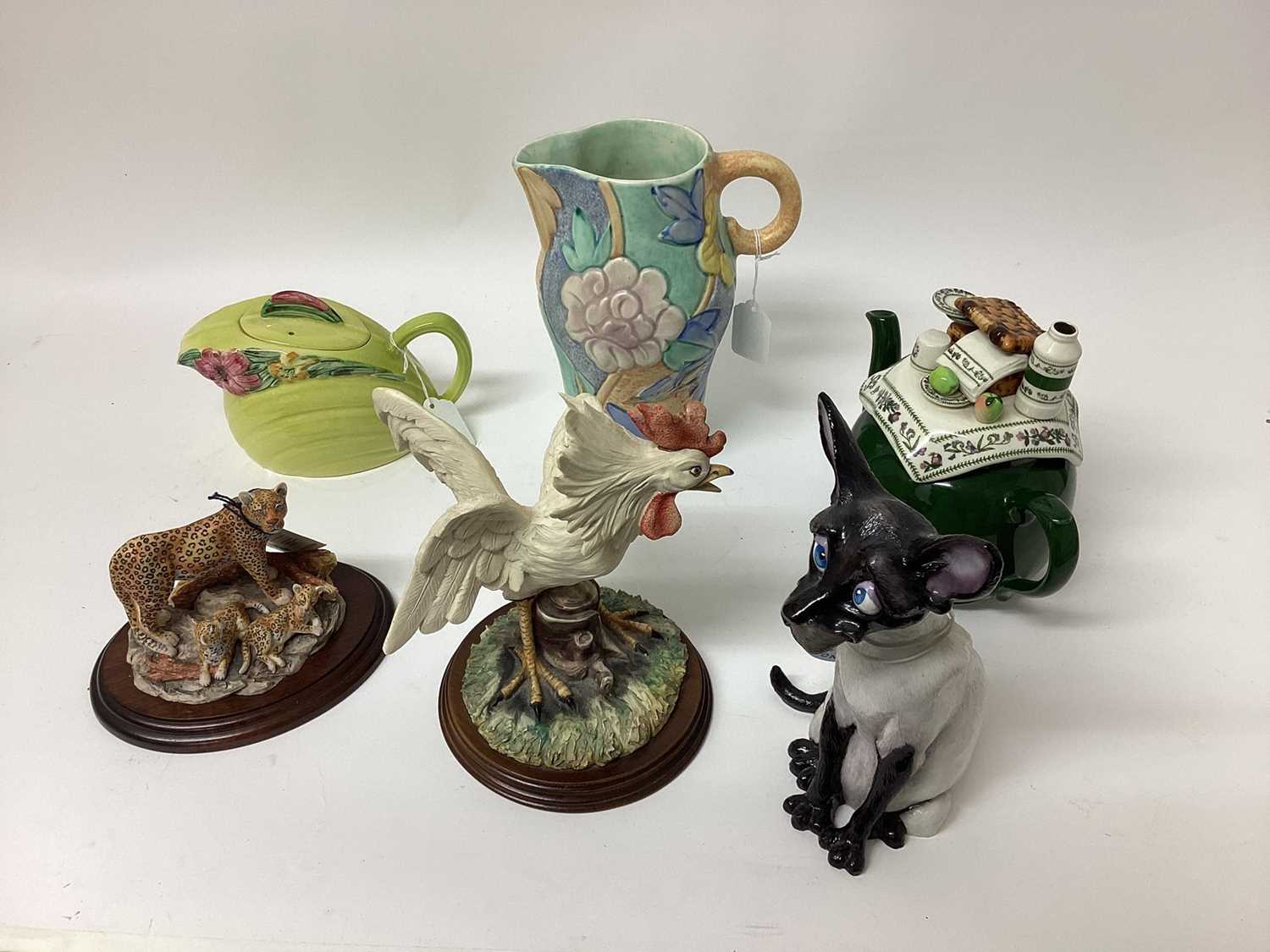 Lot 1324 - Beswick Ware jug with floral decoration, two teapots and three animal ornaments