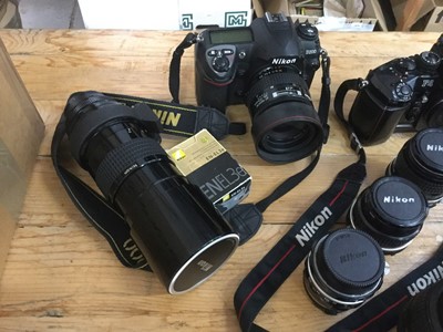 Lot 2369 - Good collection of Nikon 35mm and DSLR cameras, together with various lenses, including a Nikon F2, Nikon F4, Nikon D300, etc
