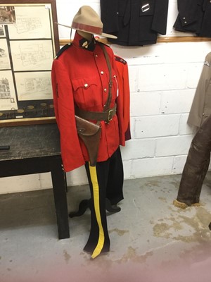 Lot 850 - Royal Canadian mounted Police uniform comprising hat, dress uniform with sharp shooters cloth badges, trousers, Sam Browne belt with holster