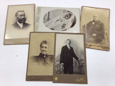 Lot 1484 - Group of five real photographic cabinet cards to including a macarbe Victorian photograph of a deceased child laying in coffin (5)