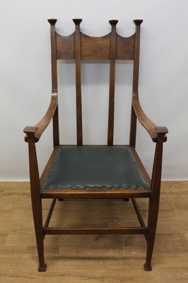 Lot 1305 - Edwardian Arts and Crafts oak elbow chair