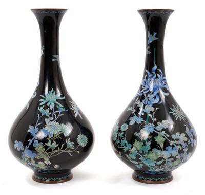 Lot 701 - Pair late 19th century Japanese cloisonné oviform vases with fine 
pale blue floral decoration on dark blue ground.