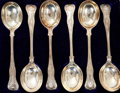 Lot 366 - Cased set of six Edwardian Kings pattern soup spoons, in velvet lined fitted case, (Sheffield 1906), maker James Dixon & Son, all at 18ozs.