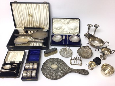 Lot 376 - George V silver sauce boat (Sheffield 1932), maker Viners, together with a late Victorian silver shell butter dish (Sheffield 1897), silver shell dishes.