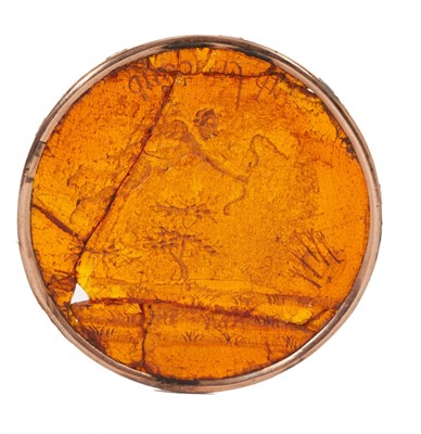 Lot 4 - Rare Roman amber and yellow metal mounted gaming counter said to have belonged to Marie Antoinette, The last Queen of France.