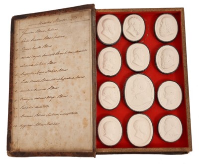 Lot 789 - Good collection of 19th century Grand Tour plaster intaglios in case and in a book.