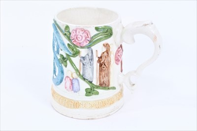 Lot 96 - A Compton Pottery mug with silver shape handle.