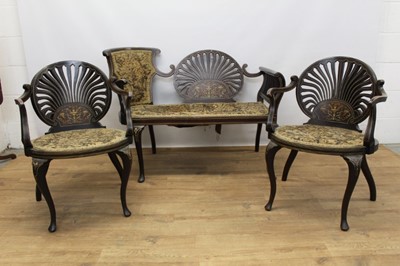 Lot 1308 - Edwardian inlaid mahogany salon suite comprising shell shaped 
pierced back panel and pair elbow chairs.