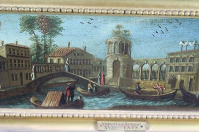 Lot 1173 - Venetian school, 17th century, pair of oils on canvas - canal scene with 
harlequins and horsemen at a bridge, both 37cm x 11cm in gilt frames (2)