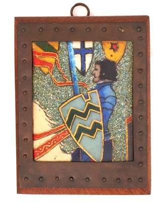 Lot 737 - Circle of Pheobe Anna Traquair (1852-1936) enamelled plaque, knight, in metalwork 
frame.