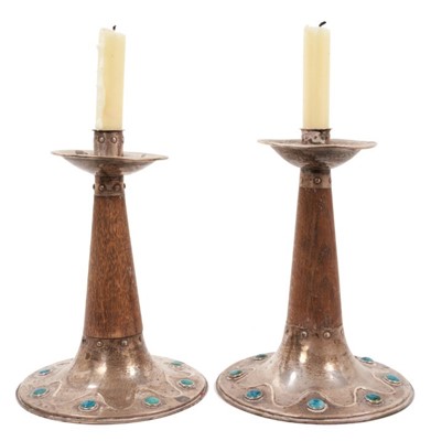 Lot 725 - Fine pair of Arts & Crafts silver and oak candlesticks