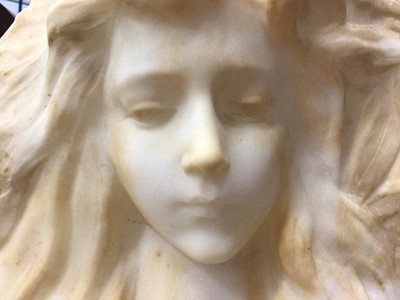 Lot 722 - Art Nouveau carved marble head of a girl with a flower in her hair