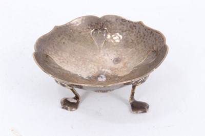 Lot 729 - Arts and crafts hammered silver salt