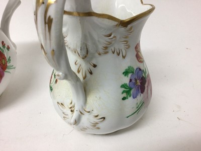 Lot 94 - Three graduated Staffordshire porcelain jugs named and 
dated 1856.